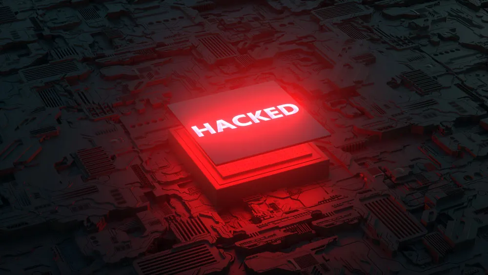 Hacked alert on a digital circuit background, symbolizing compromised computer systems, relevant to computer repair services in South Broken Hill.